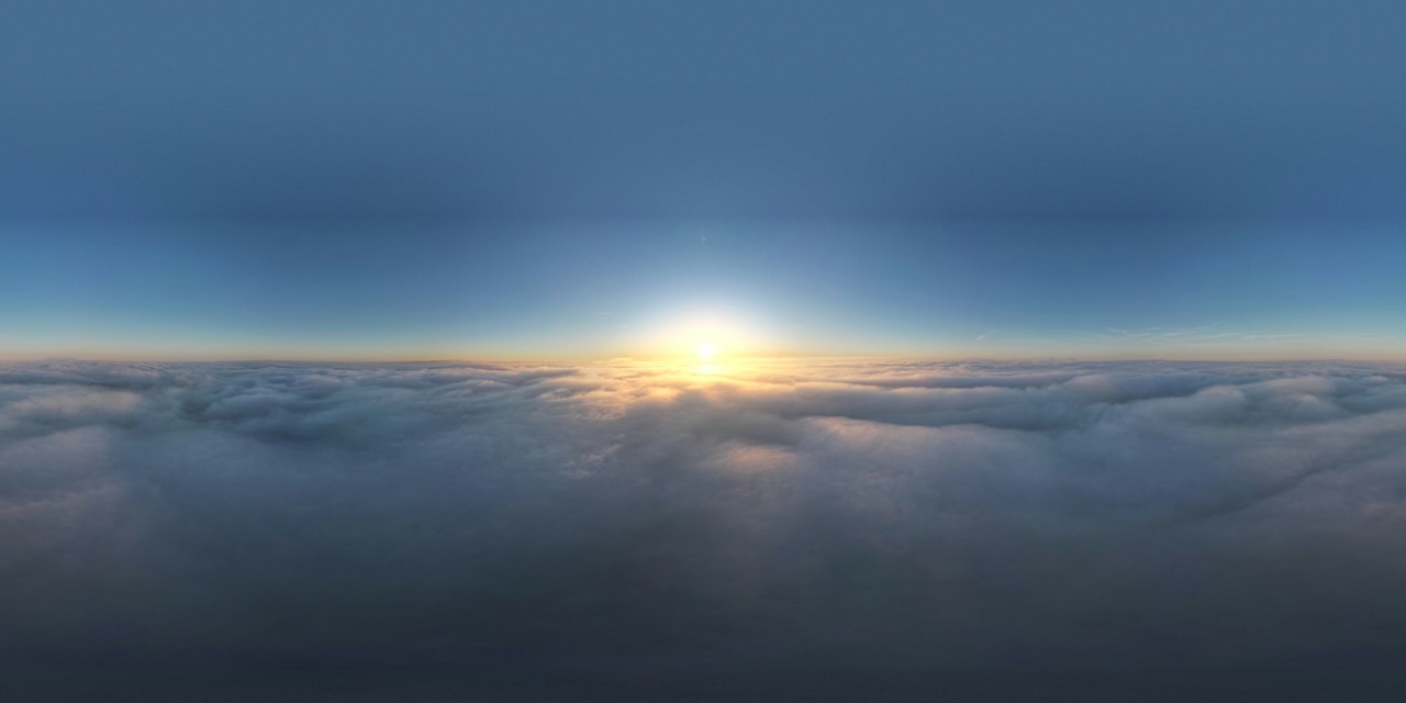 Serene view above the clouds with sunlight breaking through